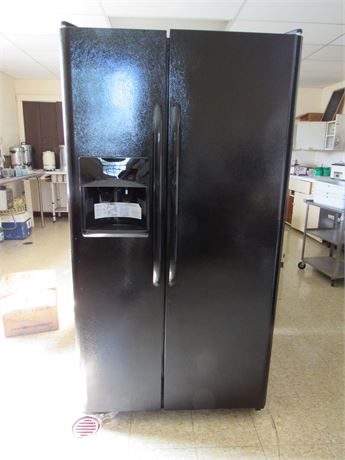 Frigidaire Side by Side Refrigerator: food not included. 2 years old